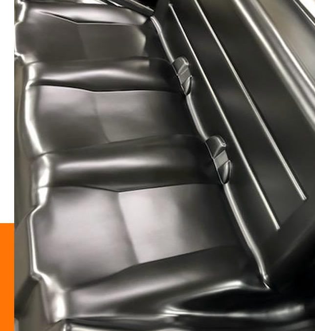 Prisoner Transport Black car seat with a smooth, shiny leather finish, featuring three seat sections designed with public safety in mind.